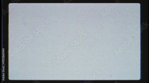 Super 8 film overlay texture with vintage noise dirt scratches and dust creating nostalgic 8mm cinematic frame effect for retro video transitions