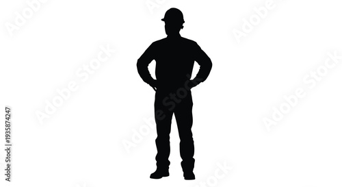 A stark full body silhouette of a man standing with hands on hips presenting a powerful and isolated figure silhouette