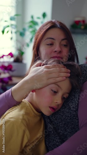 Mother comforting young son with gentle embrace at home, tender parenting moment, emotional support and intimate family connection