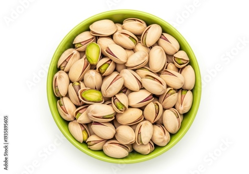 Wallpaper Mural Many salted nuts in shells fill a bright green bowl presented on a white background Torontodigital.ca