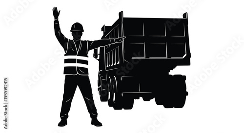 A construction worker directs a large dump truck with a raised hand captured in a striking silhouette high quality