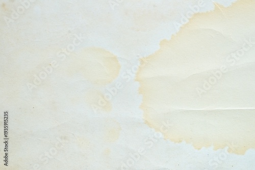 Old paper texture with large water stains and creases