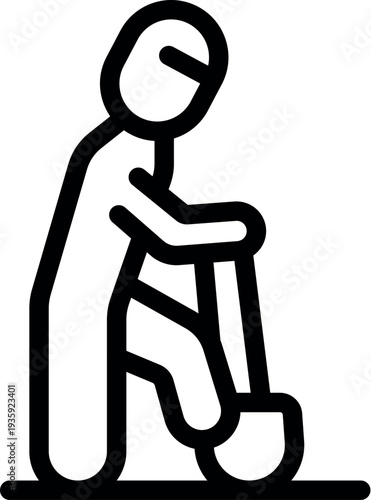 Gardener resting and leaning on a shovel after working in the garden