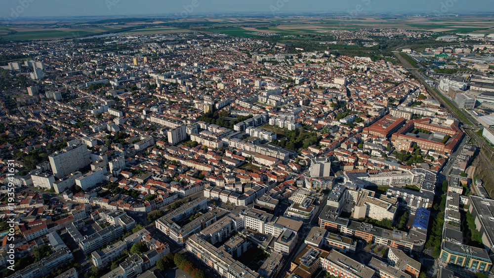 Obraz premium Aerial panoramic view above the old town around the city Reims in France on a sunny summer day. 