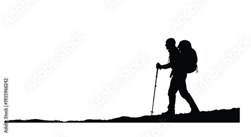 Silhouette of a hiker with a backpack walking uphill against a bright background