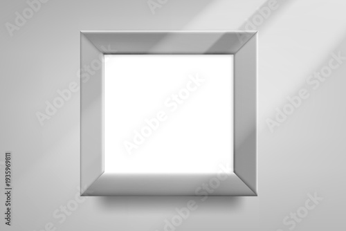 Square grey photo frame on bright wall with sun beam. 3d vector mockup