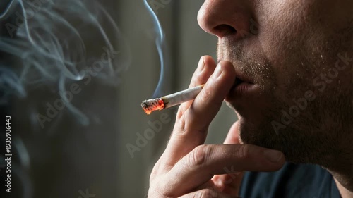 Close-up of man smoking cigarette with visible smoke, nicotine addiction and cancer prevention.