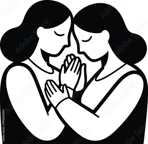 Two women pray together in a moment of contemplation and spirituality with hands clasped