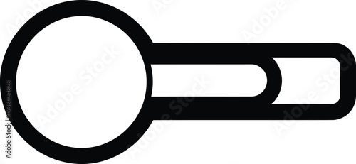 A large key with a circular head and long handle is shown.