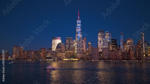 NYC glowing at night. New York skyscrapers at night, NYC. New York downtown. New York with famous skyscrapers, NYC from drone. New York Manhattan panorama with towers at night.