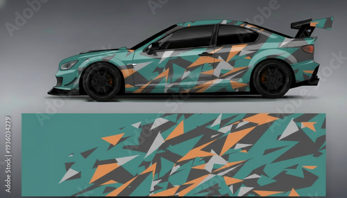 Customized sports car with a modern geometric camouflage vinyl wrap design in teal, grey, and orange colors.