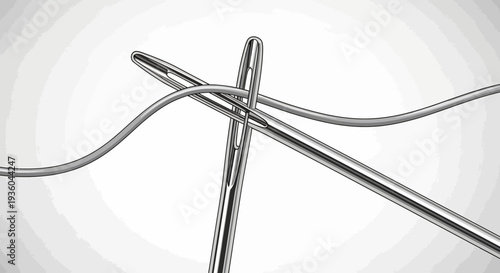 Close up of sewing needle threading through grey thread on white background