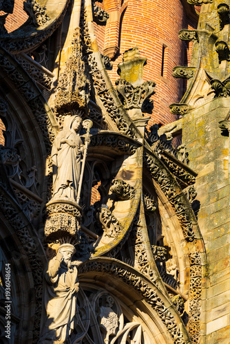 Carved detail of the stone canopy above the entrance of Sainte-Cécile Cathedral in Albi