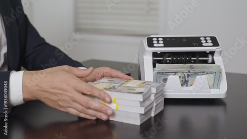 Counting dollars. Hand and money counter. management in office. Investment concept. Finance managers hands with counting machine. Finance success. Financial transactions.