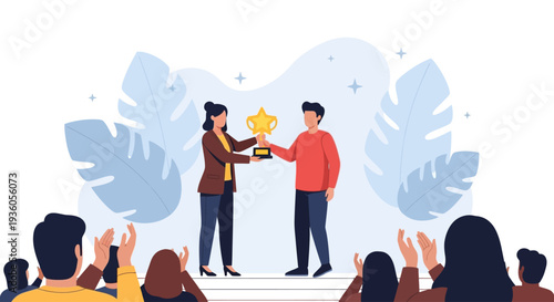 Woman presenting award to man on stage surrounded by applauding audience in a celebratory atmosphere