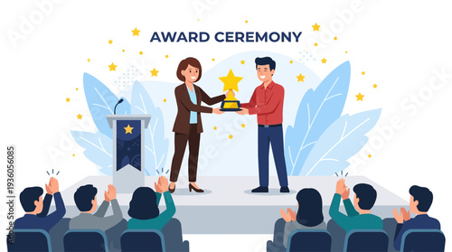 Man and woman on stage receiving award in ceremony with audience applause and celebration