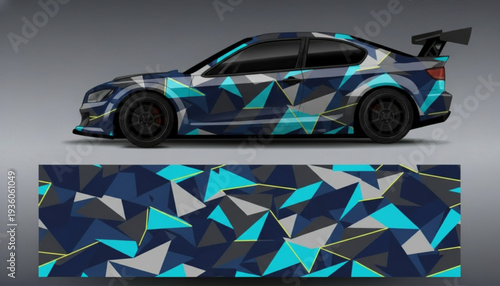 Custom wrapped sports car with a modern geometric camouflage design in blue and grey tones, showcasing the vehicle's dynamic aesthetic and graphic pattern.