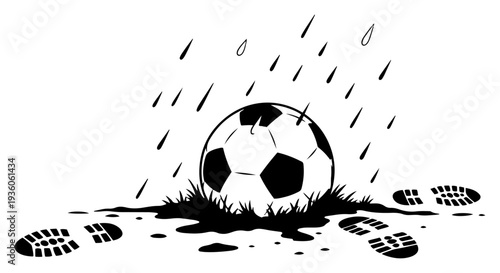 Soccer ball on a wet muddy field during heavy rain with footprints