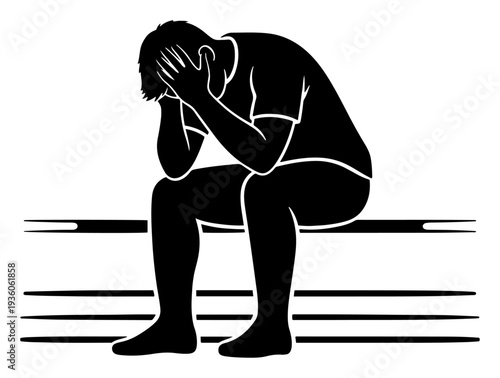 Sad man silhouette sitting on stadium bleachers with head in hands after loss