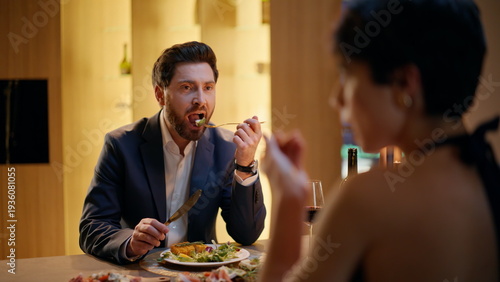 Photos Affectionate man speaking woman confessing in love at apartment dinner closeup