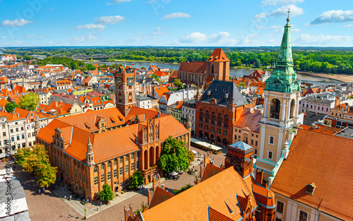 Aerial panoramic view of historical buildings and roofs in Polish medieval town Torun