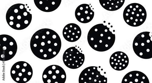 Black polka dot circles with bites missing a striking silhouette
