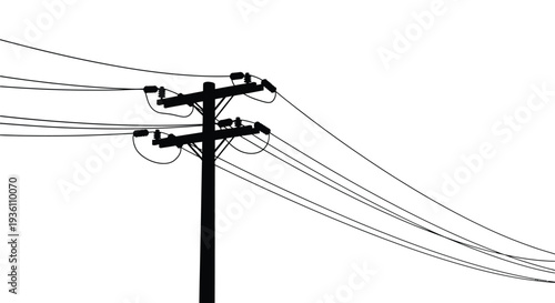 Electrical power lines and poles against a bright white sky silhouette