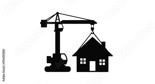 Construction crane lifting a house a stark black silhouette