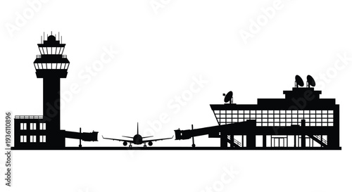 Airport control tower and terminal building in stark black silhouette