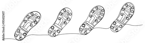 Continuous line drawing of soccer boot footprints showing the path of a player