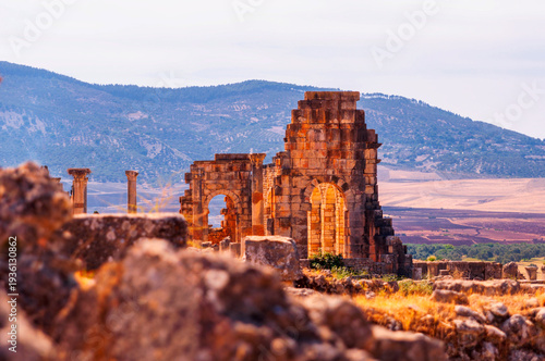 Fotografie Roman Ruins in Meknes, Morocco - Ancient Architecture and Valley Landscape