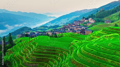 Aerial view of the spectacular Longji Rice Terraces and ethnic village landscape in Guilin, China.