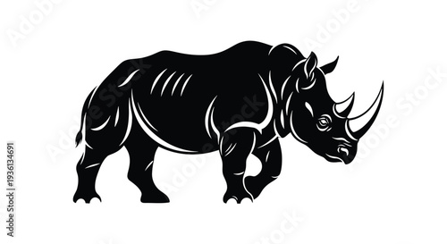 Illustration of black silhouette of a rhinoceros standing with a strong and powerful appearance