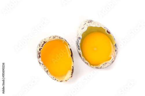 Fresh Cracked Quail Eggs with Bright Orange Yolks - High Protein Farm Food Ingredient