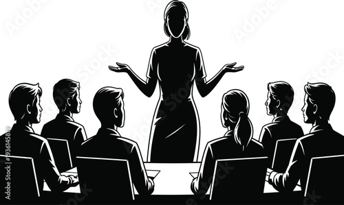 Silhouette of businesswoman presenting to colleagues in a meeting