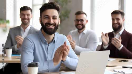 Happy Businessman Smiling with Colleagues in Modern Office Setting