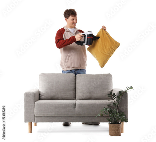 Redhead young man vacuum cl...