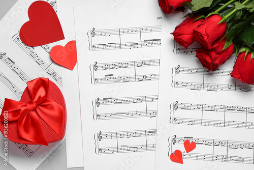 Music sheets with rose flow...