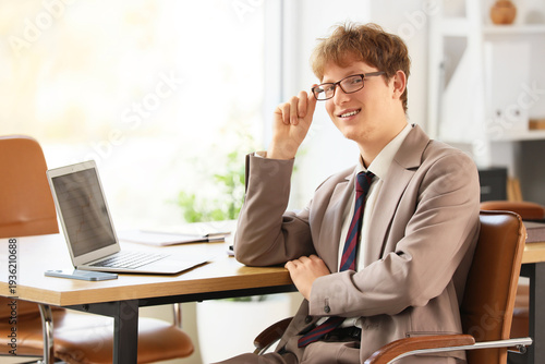 Young redhead businessman w...