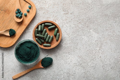 Bowls of spirulina powder a...