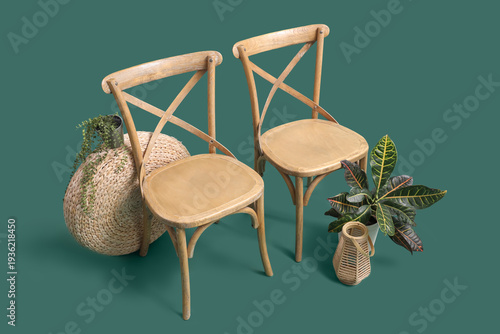 Wooden chairs with plants a...