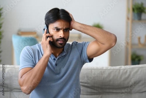 Stressed man on phone call receiving bad news financial problem concept