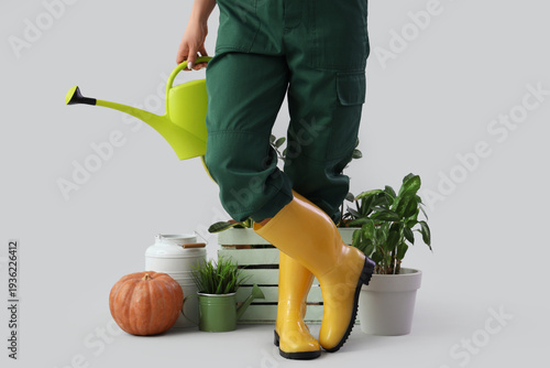 Young female gardener with ...
