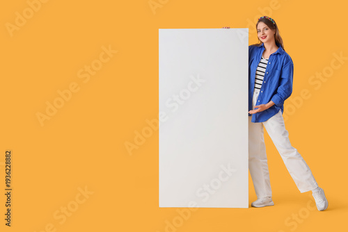 Young woman with blank post...