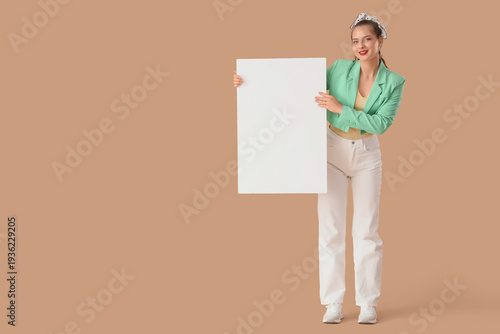 Young woman with blank post...