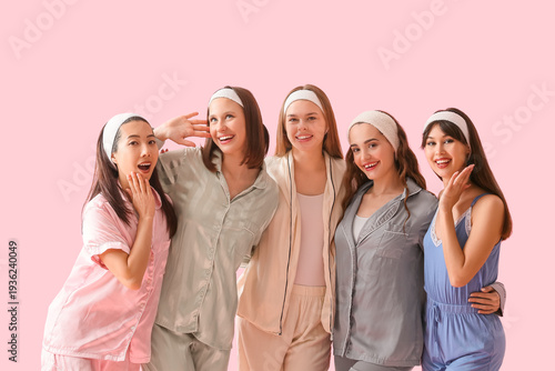 Group of young women in paj...