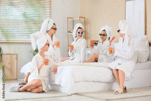 Group of young women in bat...