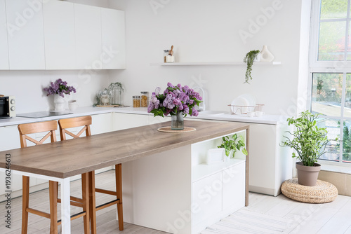Interior of light kitchen w...