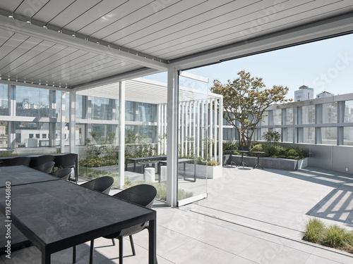 Photos Modern outdoor terrace and landscaped public space with seating and architectura
