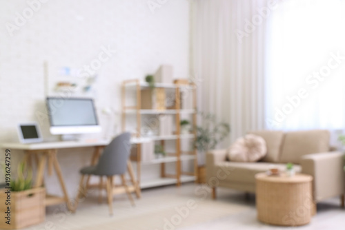 Blurred view of office with...